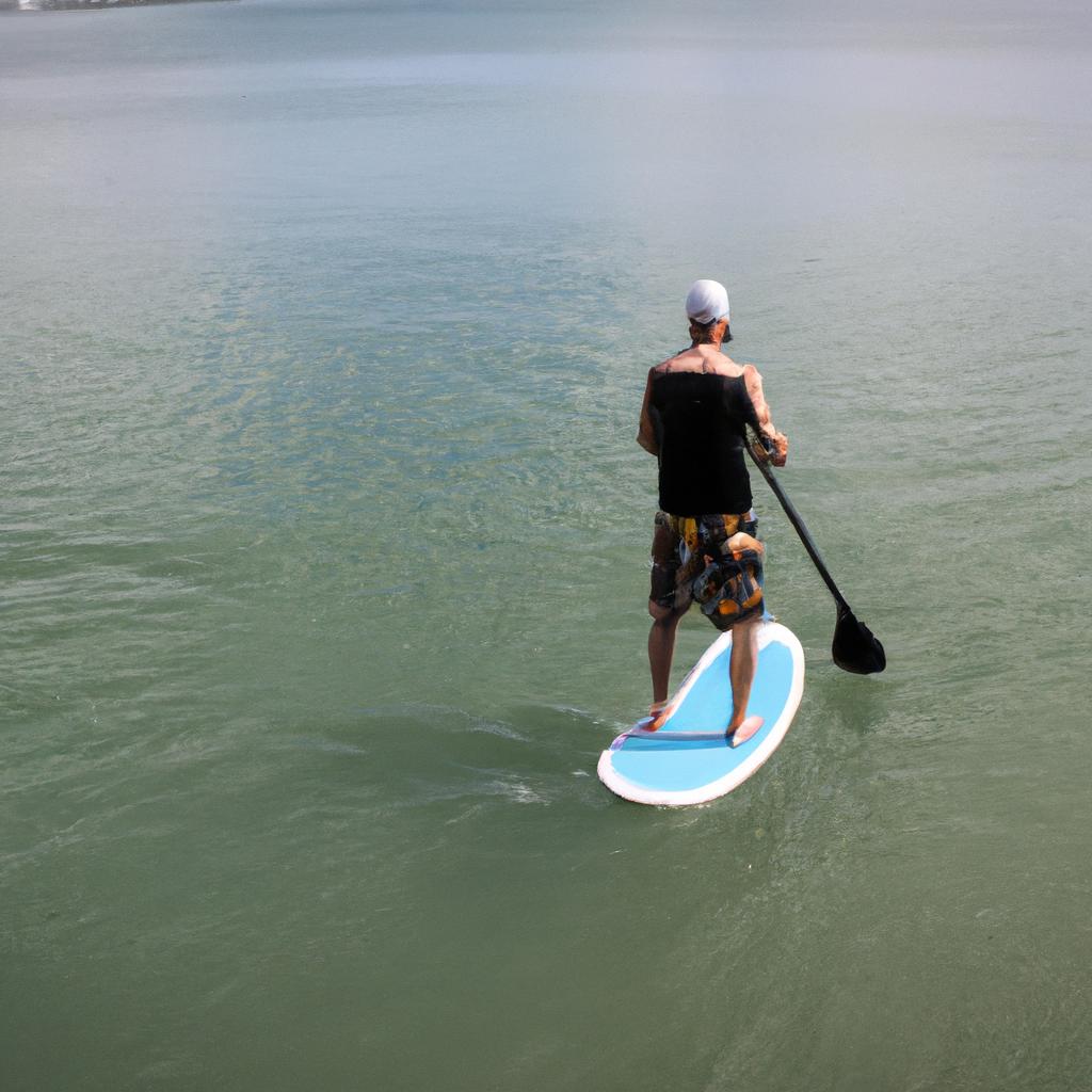 Person paddleboarding on different boards