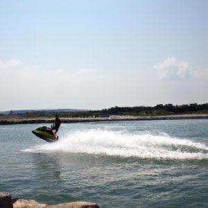 Person jet skiing on water