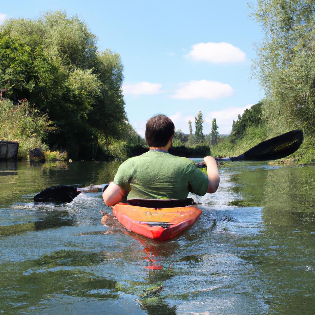 Person kayaking on a river